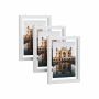 Set of 3 floating photo frames.